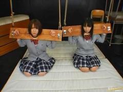 Two Asian schoolgirls are extremely dominated by group of men