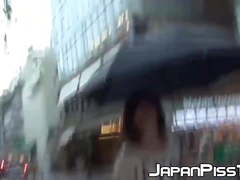 Young Japanese takes her panties off to pee in a coffee shop
