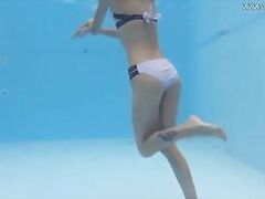 Tiny petite skinny sexy babe Hermione Ganger underwater
