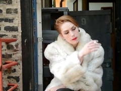 Pierced Babe Smoking in Fur & Leather