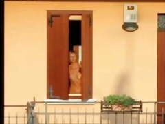 Neighbour cleaning the window (ONE)