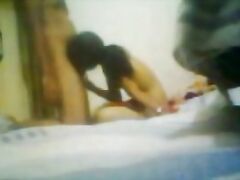 Desi girl and boy in hotel room and the guy hikes the top of the babe to expose and suck her tits before fucking her missionary style and cumming inside her and then cleaning her pussy while their friend shoots this awesome MMS.