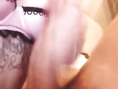 tatted babe giving oral pleasure