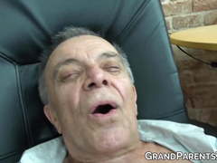 Teen jerks her lover off while they watch seniors fuck hard