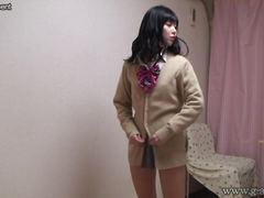 Naked Japanese Schoolgirl wears a Miniskirt School Uniform