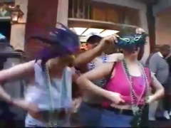 A couple teachers flashing at mardi gras