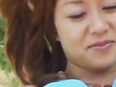 Hot Asian milf in a blue bikini sucks cock and rides it hard outdoors.
