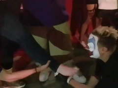 Clown Having Some Feet On His Face