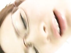 Tempting Japanese AV teen girl Yui Shirasagi relaxes in bed with her legs spread apart, expecting for a cute body teasing.