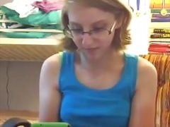 Cute nerdy glasses girl showing off